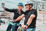 Cycling, smile and fitness with old couple and selfie for social media, workout and health training. Wellness, internet and blog with senior man and woman with phone for bicycle, exercise and travel