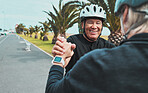 Roller skate, holding hands and senior couple smile in city for exercise, fitness hobby and skating activity. Retirement, wellness and happy elderly man helping woman for balance, training and sports