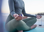 Woman, hands and yoga in meditation for zen, spiritual wellness or calm exercise on the beach. Hand of female yogi meditating for peaceful healing, lotus pose or fitness in awareness on mat by ocean