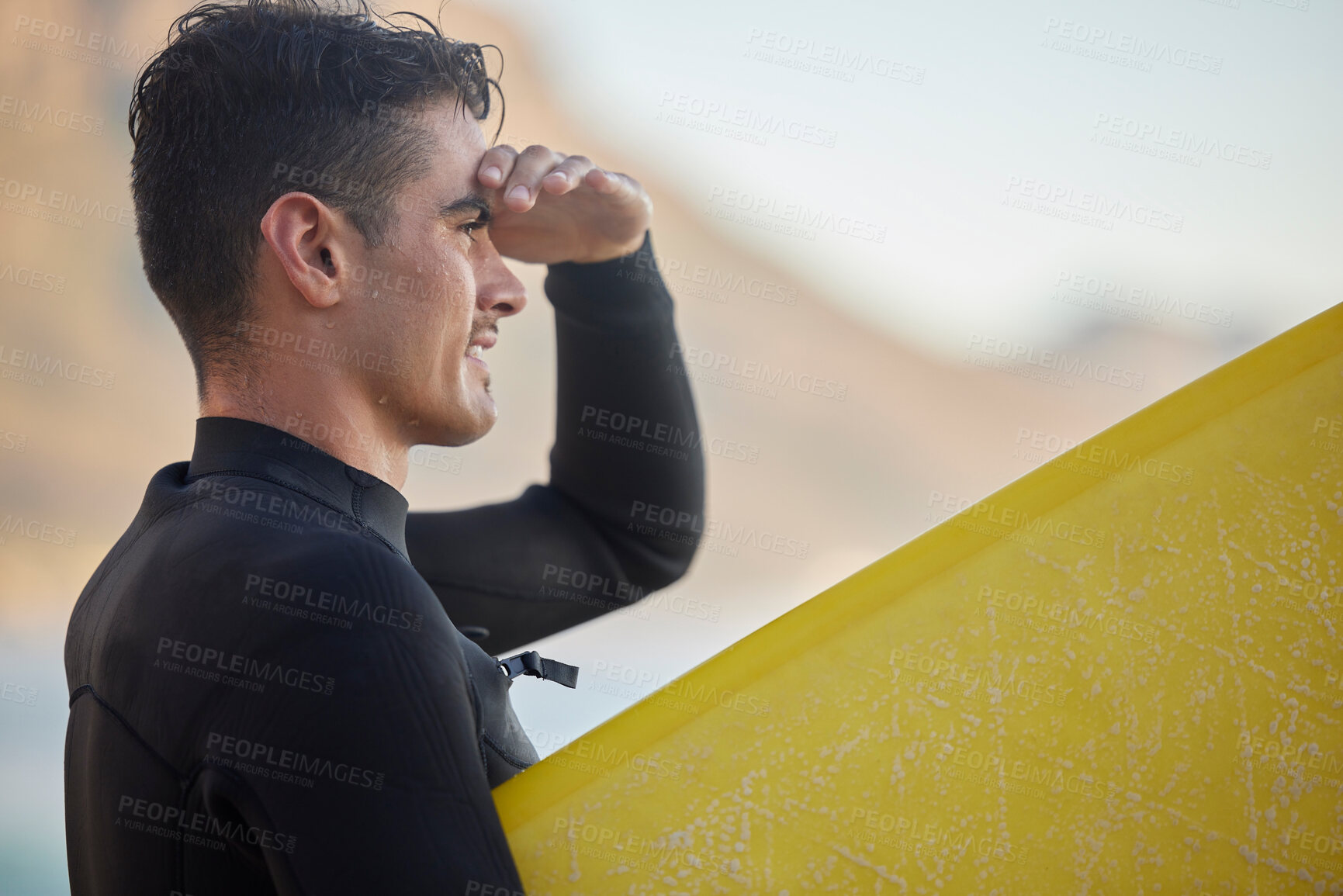 Buy stock photo Surfer man, ocean and looking with smile for waves, excited and hand by eyes for view in morning sunshine. Sea athlete profile, surfboard and focus face for fitness, sports and adventure for workout