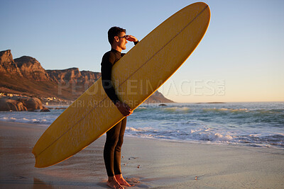 Buy stock photo Surfer, man and beach with looking, waves and hand by eyes for safety from sun, thinking or planning morning. Ocean athlete, surfboard or water for fitness, sports and tropical adventure for exercise