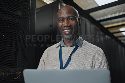 Buy stock photo Laptop, portrait and IT black man in server room for research, engineer working in dark data center lobby. Face, cybersecurity or analytics with male programmer problem solving or troubleshooting