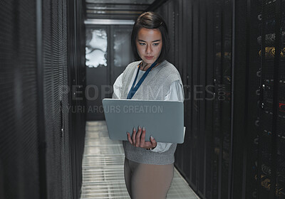 Buy stock photo Woman with laptop, server room and IT, engineer and datacenter with software update and programming. Tech industry, cybersecurity and network with Asian female setting up firewall and database