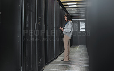 Buy stock photo Tablet, server room and data center with a programmer asian woman at work on a computer mainframe. Software, database and information technology with a female coder working alone on a cyber network
