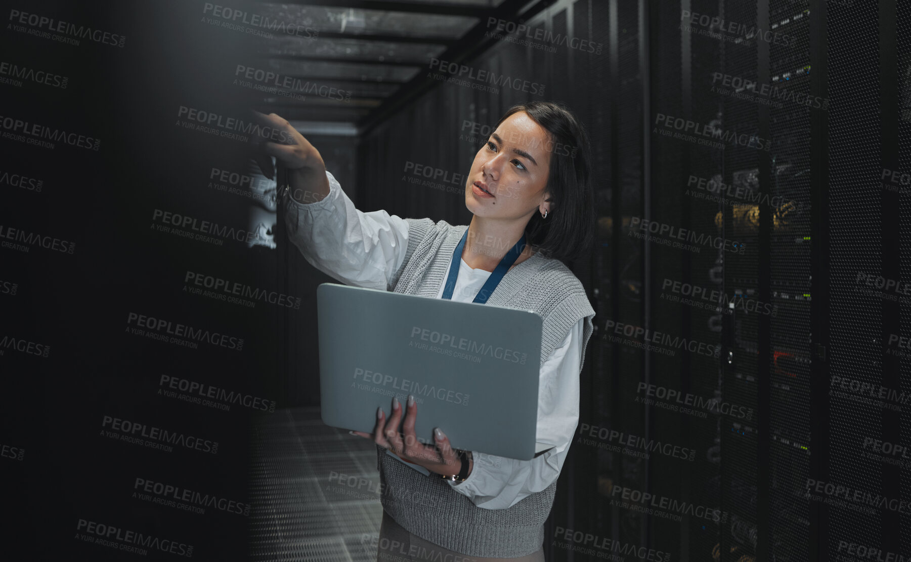 Buy stock photo Laptop, maintenance or IT woman in server room for research, engineer working in data center. Computer, cybersecurity and girl programmer with tech for problem solving, diagnose or troubleshooting