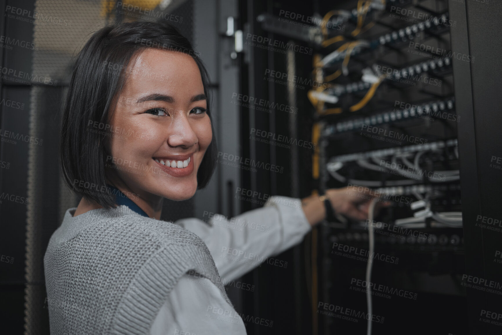 Buy stock photo Asian woman, portrait smile and technician by server for networking, maintenance or systems at office. Happy female engineer smiling for cable service, power or administration in data center room