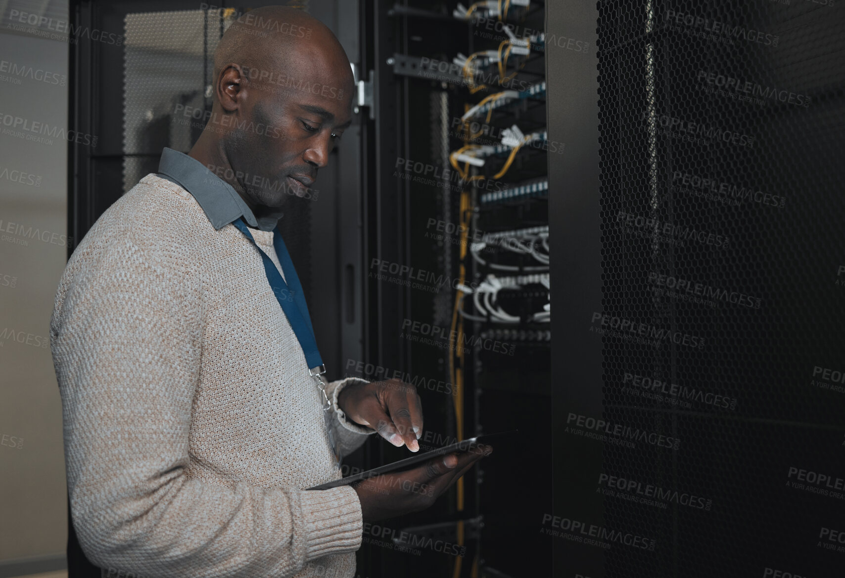 Buy stock photo Engineer, server room or black man with tablet for database connection cable, maintenance or software update at night. Cybersecurity, IT and male coder with technology for networking in data center. 