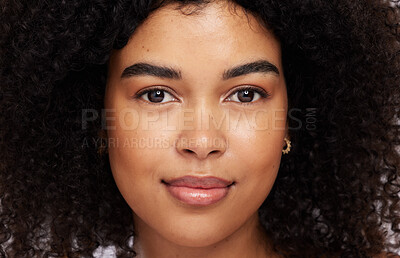 Buy stock photo Portrait, beauty and afro with a model black woman in studio for skincare, haircare or cosmetics. Face, hair and natural with an attractive young female posing for skin treatment or antiaging care