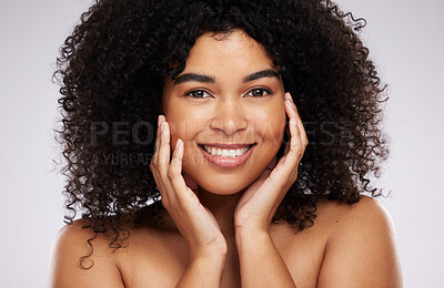 Buy stock photo Portrait, beauty and afro with a model black woman in studio on a gray background for natural hair treatment. Face, skincare and haircare with an attractive young female posing to promote cosmetics