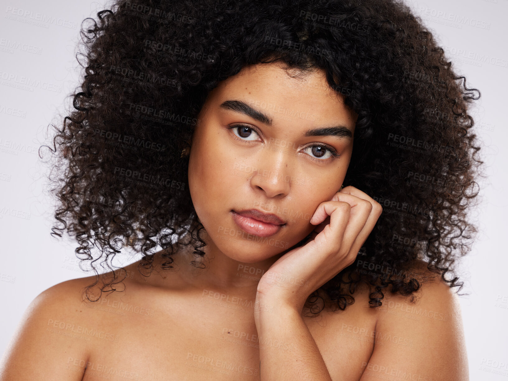 Buy stock photo Skincare, beauty and portrait of black woman with hand on face, afro and advertising luxury makeup product promo. Dermatology, cosmetics and facial skin care on model isolated on studio background.