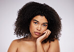 Dermatology, beauty and portrait of black woman with hand on face, afro and advertising luxury makeup product promo. Skincare, cosmetics and facial skin care on model isolated on studio background.