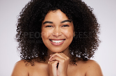 Buy stock photo Portrait, face and afro with a model black woman in studio on a gray background for natural hair treatment. Beauty, skincare and haircare with an attractive young female posing to promote cosmetics