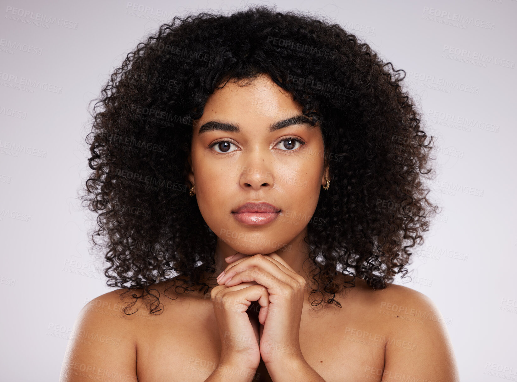 Buy stock photo Beauty, skincare and portrait of a serious black woman with cosmetics isolated on a grey studio background. Makeup, young and face of a model with a fresh afro, cosmetology and elegant on a backdrop