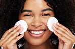 Smile, cotton pad and portrait of black woman for wellness, luxury spa and natural glow in studio. Dermatology, skincare and face zoom of happy girl with swab for makeup, cosmetic and facial cleaning