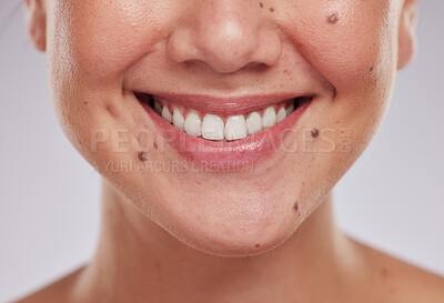 Buy stock photo Closeup, teeth and woman with dental care, cosmetics and treatment against grey studio background. Zoom, female and lady with whitening, mouth and oral care with smile, morning routine and grooming