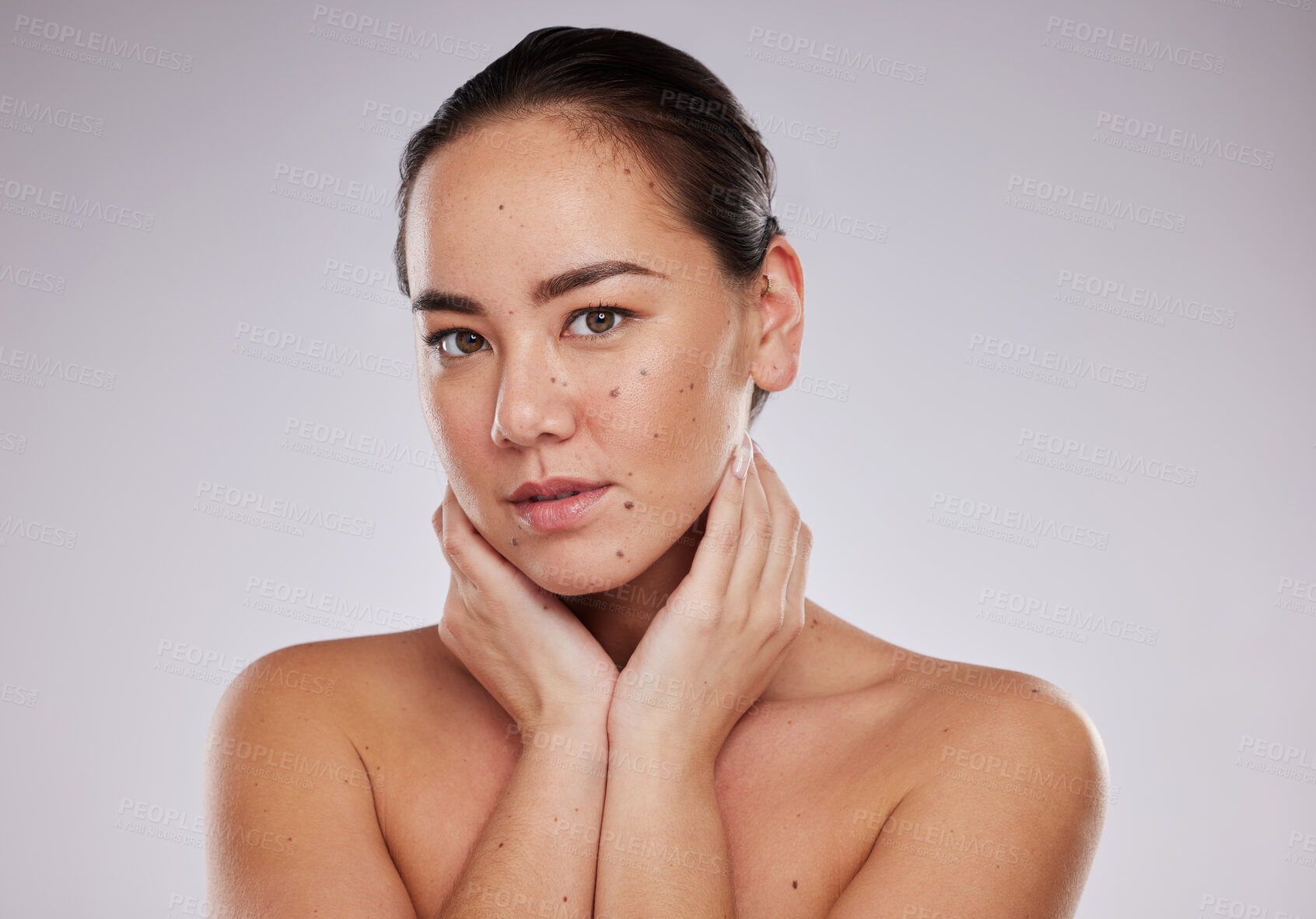 Buy stock photo Beauty, face and portrait of a woman in studio for skincare, dermatology and cosmetic for skin glow. Aesthetic asian model person with makeup shine and luxury self care facial grey background