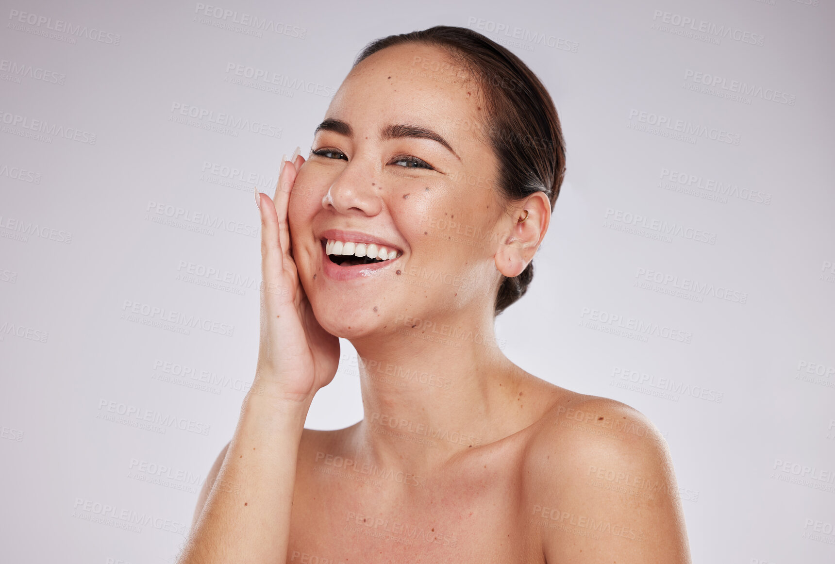 Buy stock photo Asian woman, face and portrait of woman beauty in studio for skincare, dermatology and cosmetics. Happy aesthetic model smile with hand on skin for makeup and self care facial on grey background