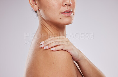 Buy stock photo Skincare, shoulder and woman hands on body for aesthetic wellness, cosmetics or self love on studio background. Beauty model, soft skin and healthy dermatology of salon transformation, glow and laser