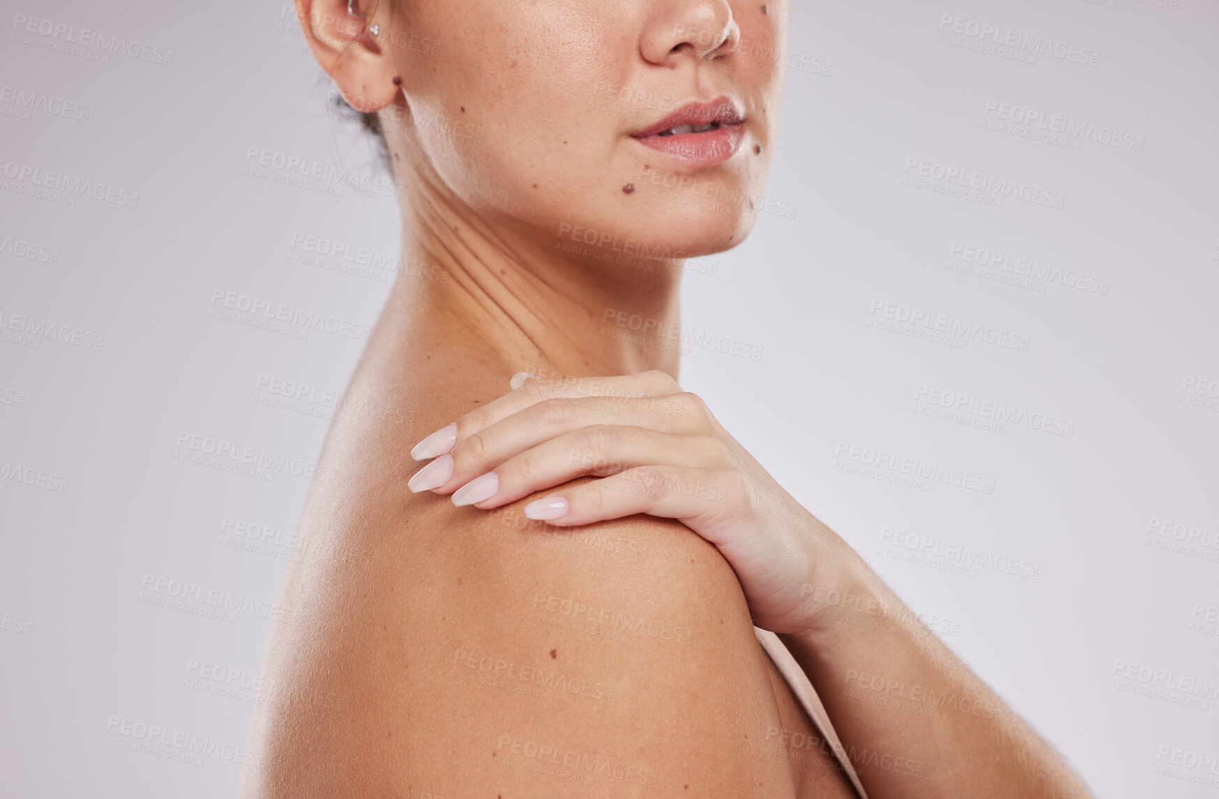 Buy stock photo Skincare, shoulder and woman hands on body for aesthetic wellness, cosmetics or self love on studio background. Beauty model, soft skin and healthy dermatology of salon transformation, glow and laser