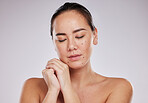 Beauty, asian woman and face for skincare in studio for collagen, dermatology and skin glow. Aesthetic model person with luxury spa facial for self care or health and wellness on gray background