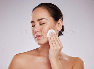 Buy stock photo Face, skincare cotton and woman with eyes closed  in studio isolated on a gray background. Makeup hygiene, beauty aesthetics and young female model with facial pad or product for cleaning cosmetics.