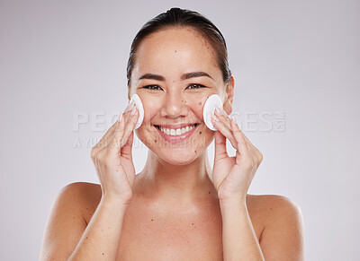 Buy stock photo Face portrait, skincare cotton and Asian woman in studio isolated on a gray background. Makeup hygiene, beauty dermatology and happy female model with facial pad or product for cleaning cosmetics.