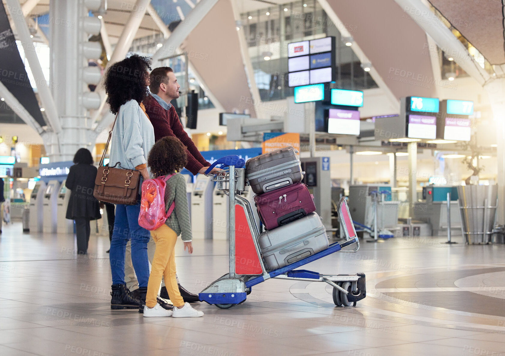 Buy stock photo Travel with parents, mom with child at airport and immigration farewell together. Family looking for flight, father with mother carrying luggage or greeting dad goodbye at international terminal