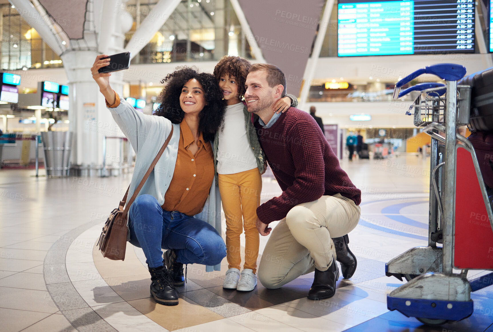 Buy stock photo Family selfie, airport and child with parents for travel, diversity and interracial bonding with smile. Man, happy black woman and girl kid with smartphone for profile picture on social media app