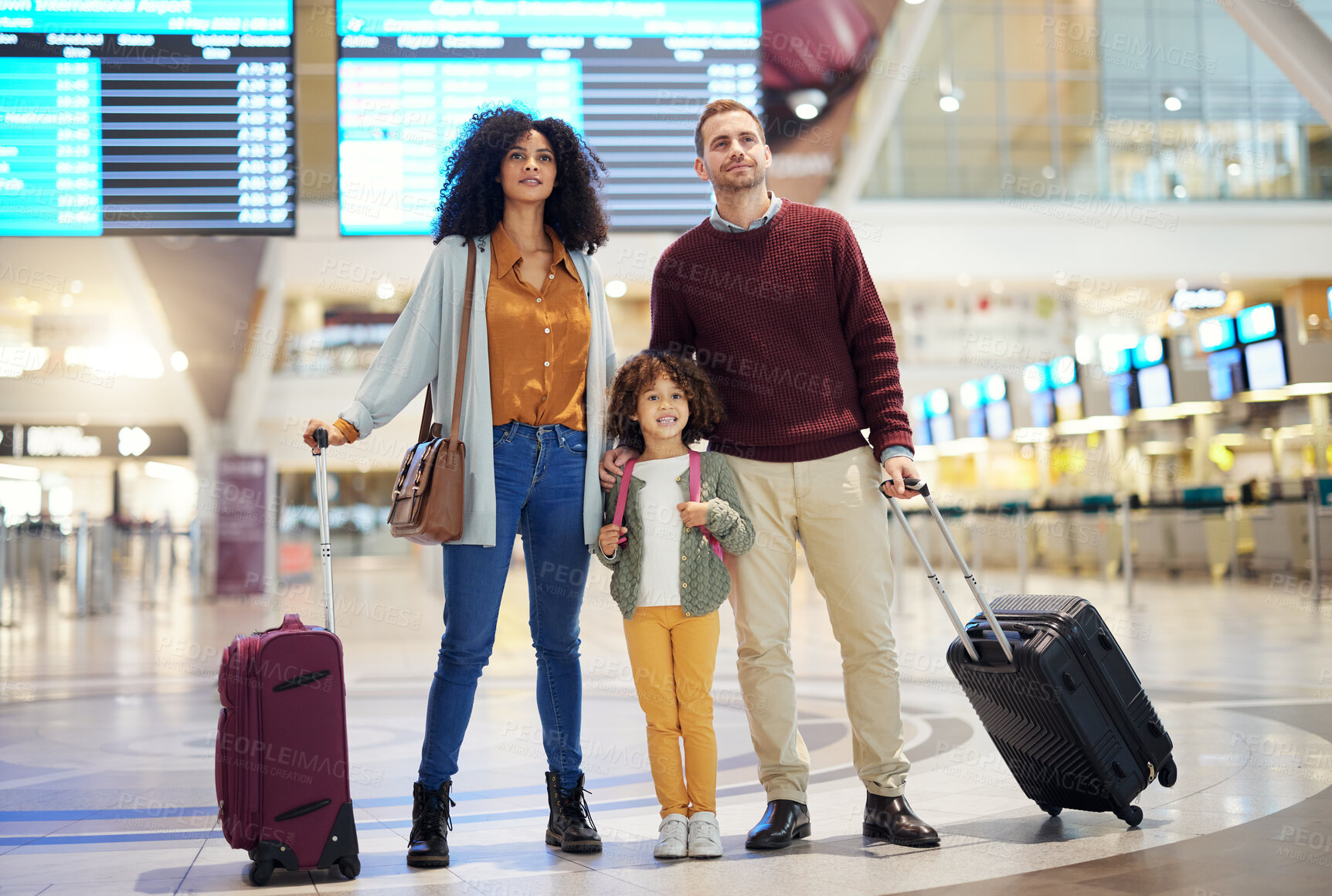 Buy stock photo Family, holding hands at airport and travel for holiday, parents and child look at flight schedule for vacation. Interracial, adventure and people at airline, transportation and journey with luggage