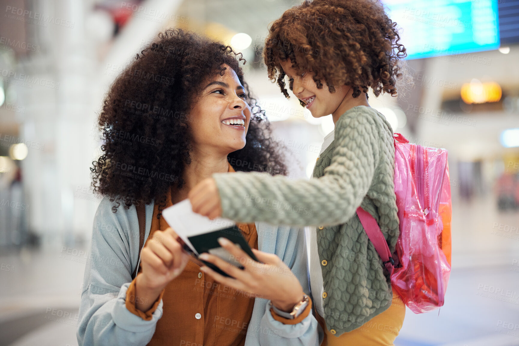 Buy stock photo Travel, passport and woman with her kid in the airport checking their boarding pass together. Trip, technology and mother browsing on a cellphone with girl child while waiting for flight in terminal.