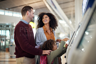 Buy stock photo Self service, travel and interracial with family in airport for check in, vacation and global. Technology, digital and smile with parents and child for holiday, flight and ticket information