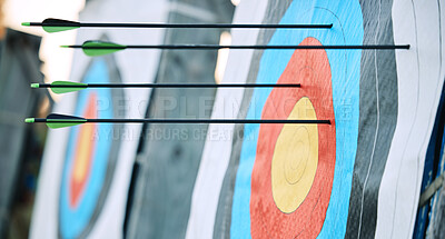 Buy stock photo Arrows in archery target or circle for competition, game or learning in field outdoor for sports background. Sport event, icon or eye goal with arrow on board for gaming, adventure and shooting