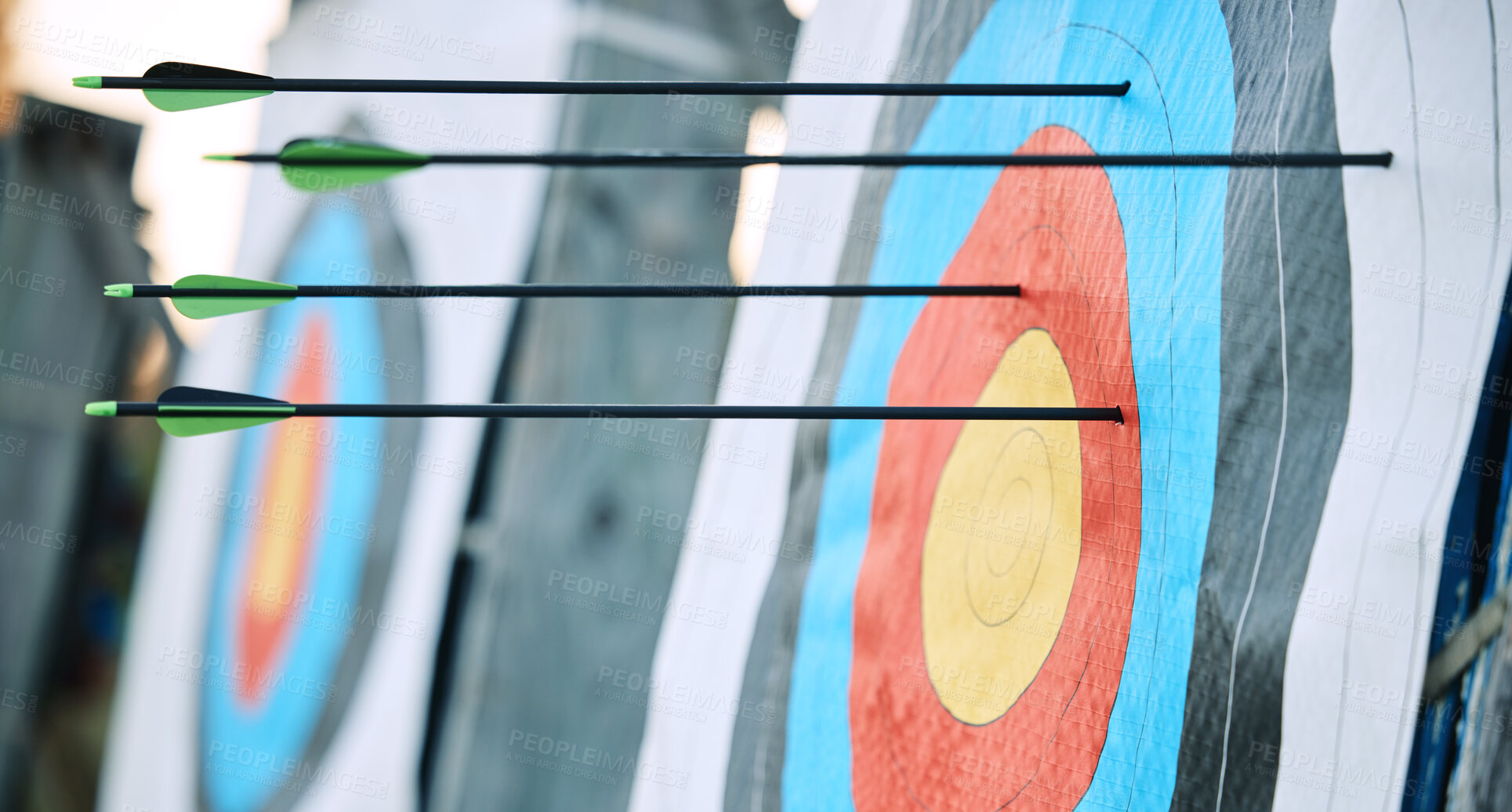 Buy stock photo Arrows in archery target or circle for competition, game or learning in field outdoor for sports background. Sport event, icon or eye goal with arrow on board for gaming, adventure and shooting