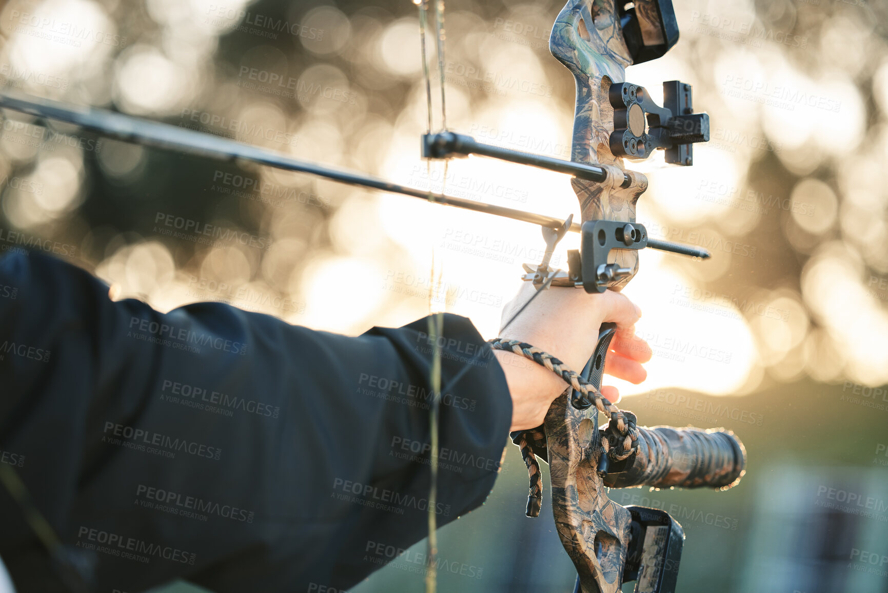 Buy stock photo Hands, bow and arrow with aim for target, training and exercise for goal, mission and learning for sport. Shooting range, competition and archer with accuracy, exercise and focus for archery sports