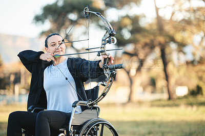 Buy stock photo Disabled sports woman, outdoor archery in wheelchair and challenge with active lifestyle in Canada. Person with disability in a park, fitness activity to exercise arms and aim arrow for hobby