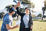 Woman, archery and personal trainer high five in sports for partnership, success or celebration on the grass field. Happy sporty female smile and touching hand of male coach for archer sport training