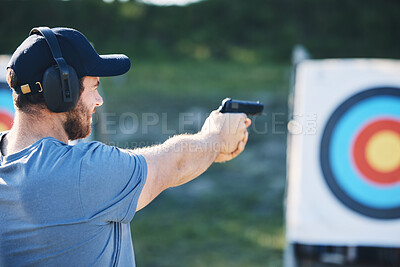 Buy stock photo Man, firearm training and target for outdoor challenge, goals and aim for police, army or security academy. Shooting expert, pistol or gun for sport, safety and combat exercise in nature with vision