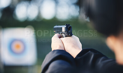 Buy stock photo Hands, gun and aim at shooting range target with weapon outdoor for security training. Person learning defence for safety and focus for sport competition or game with handgun gear and bullseye board