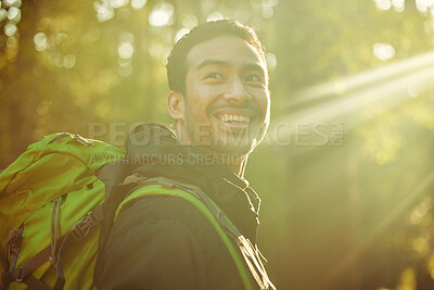 Buy stock photo Man, backpacker or hiker in sunshine forest, trekking woods or nature trees in adventure, morning exercise or Japanese fitness. Smile, happy or hiking in sunrise environment, lens flare or wellness