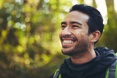 Buy stock photo Japanese man, backpacker and hiking in nature forest, trekking woods or trees in adventure, workout or fitness exercise. Smile, happy and environment hiker for travel freedom or healthcare wellness