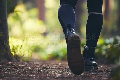 Buy stock photo Walking man, legs and hiking in forest, nature woods or trail for adventure, workout or fitness exercise. Zoom, feet or hiker shoes on environment path for healthcare, cardiology wellness or freedom