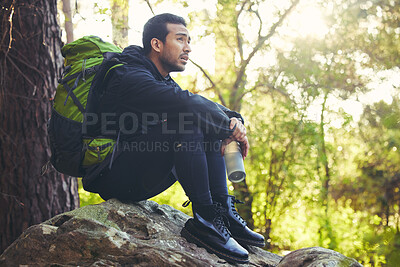 Buy stock photo Tired, hiking or water bottle in woods, nature forest or fitness environment for relax, electrolytes or Japanese healthcare. Hiker man, backpacker or sports drink in rest, recovery or fatigue break