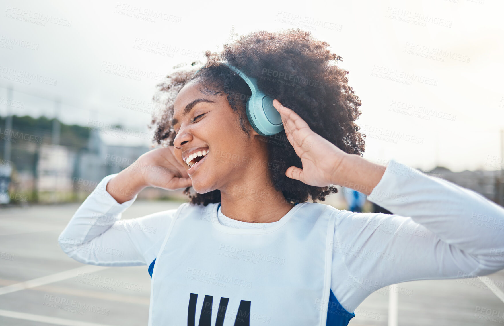 Buy stock photo Fitness, freedom and music for black woman training at court, happy and relax with wellness track. Sports, podcast and girl smile with radio, playlist or song during exercise and workout