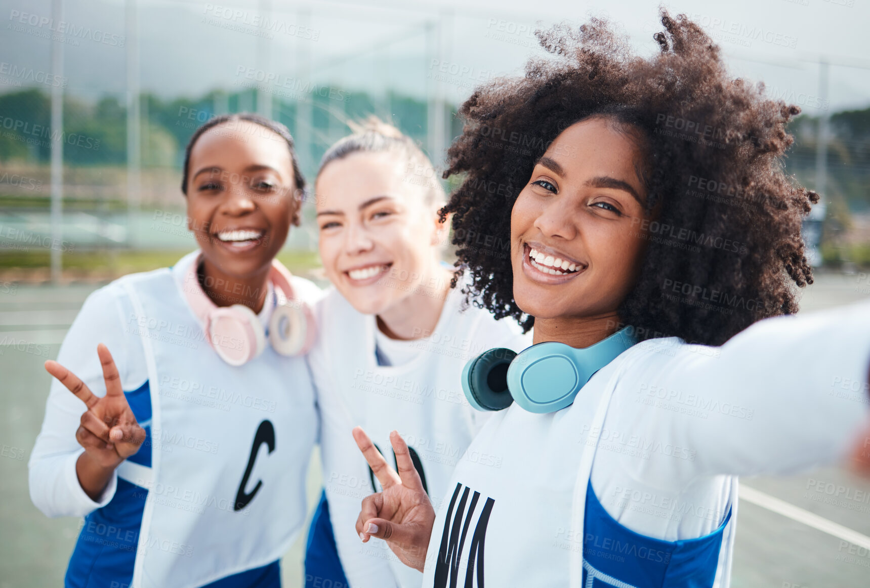 Buy stock photo Friends, selfie and women in portrait, netball and sports with team on court outdoor, smile and peace hand sign. Diversity, headphones and gen z with fitness, train for game and happy in picture