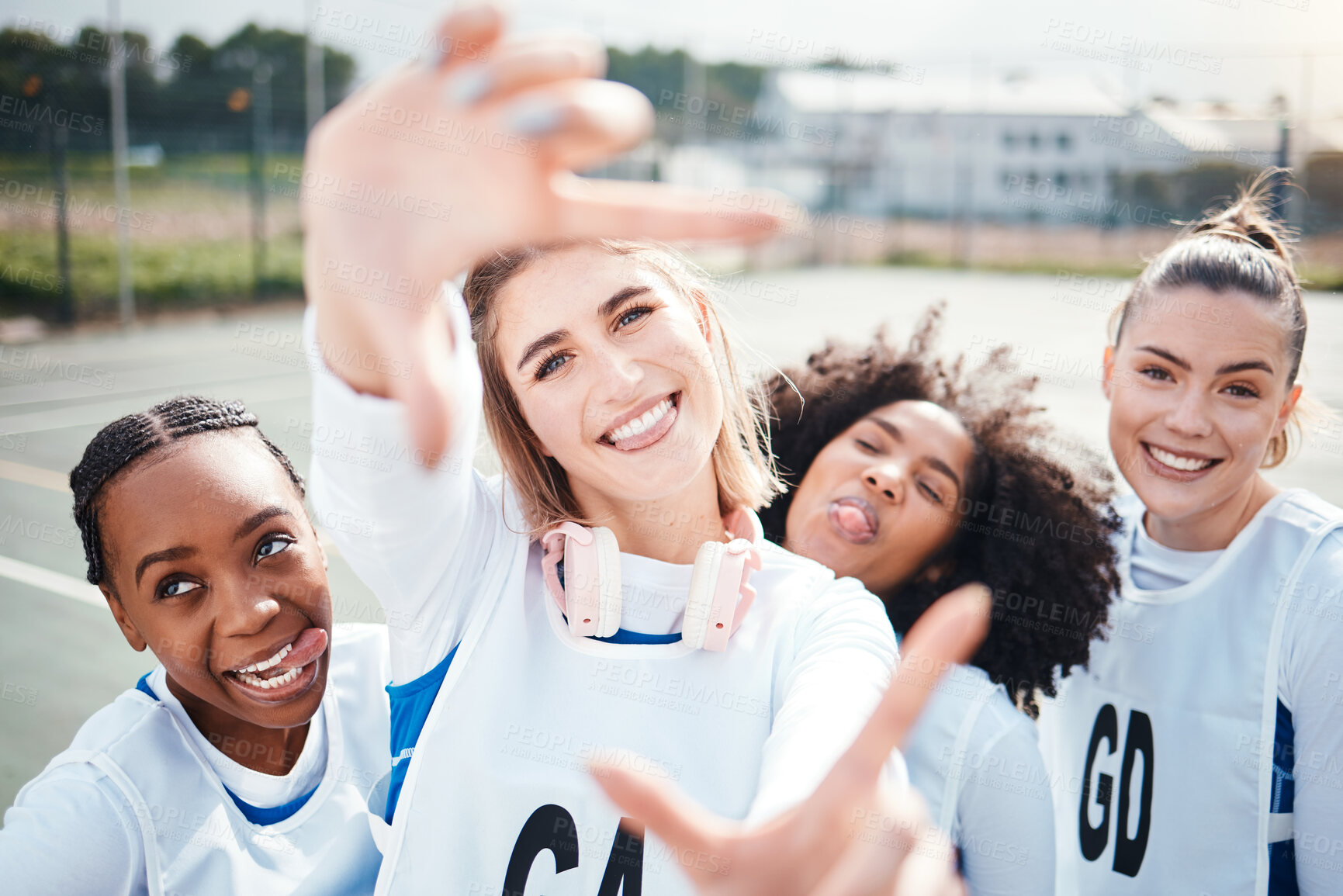 Buy stock photo Selfie, frame and a woman sports team having fun on a court outdoor together for fitness or training. Portrait, netball and funny with a group of athlete friends posing for a photograph outside