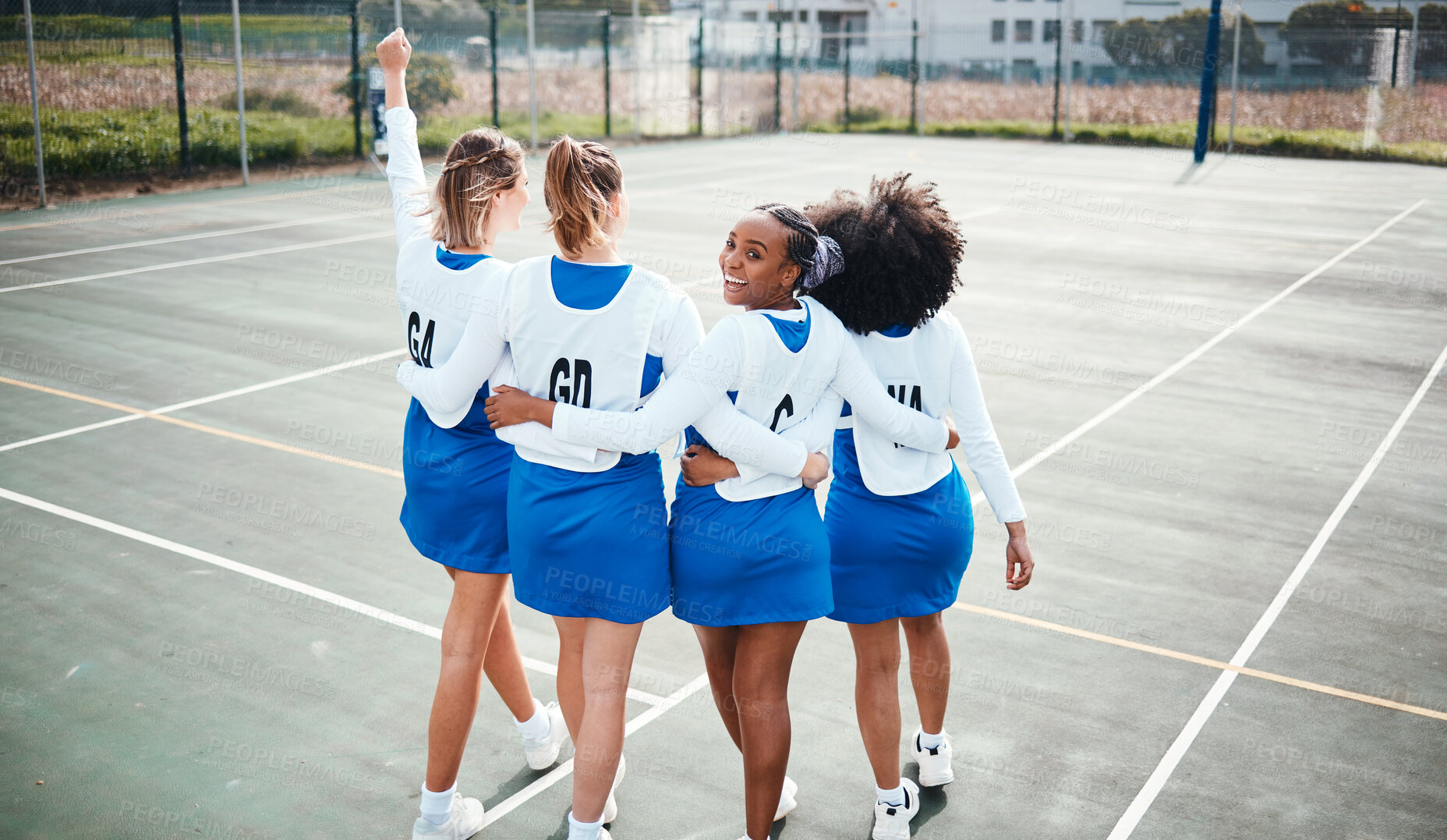 Buy stock photo Hug, back and portrait of a team for netball, training support and game collaboration on a court. Teamwork, motivation and athlete girls ready to start a sport with group unity, together and bonding