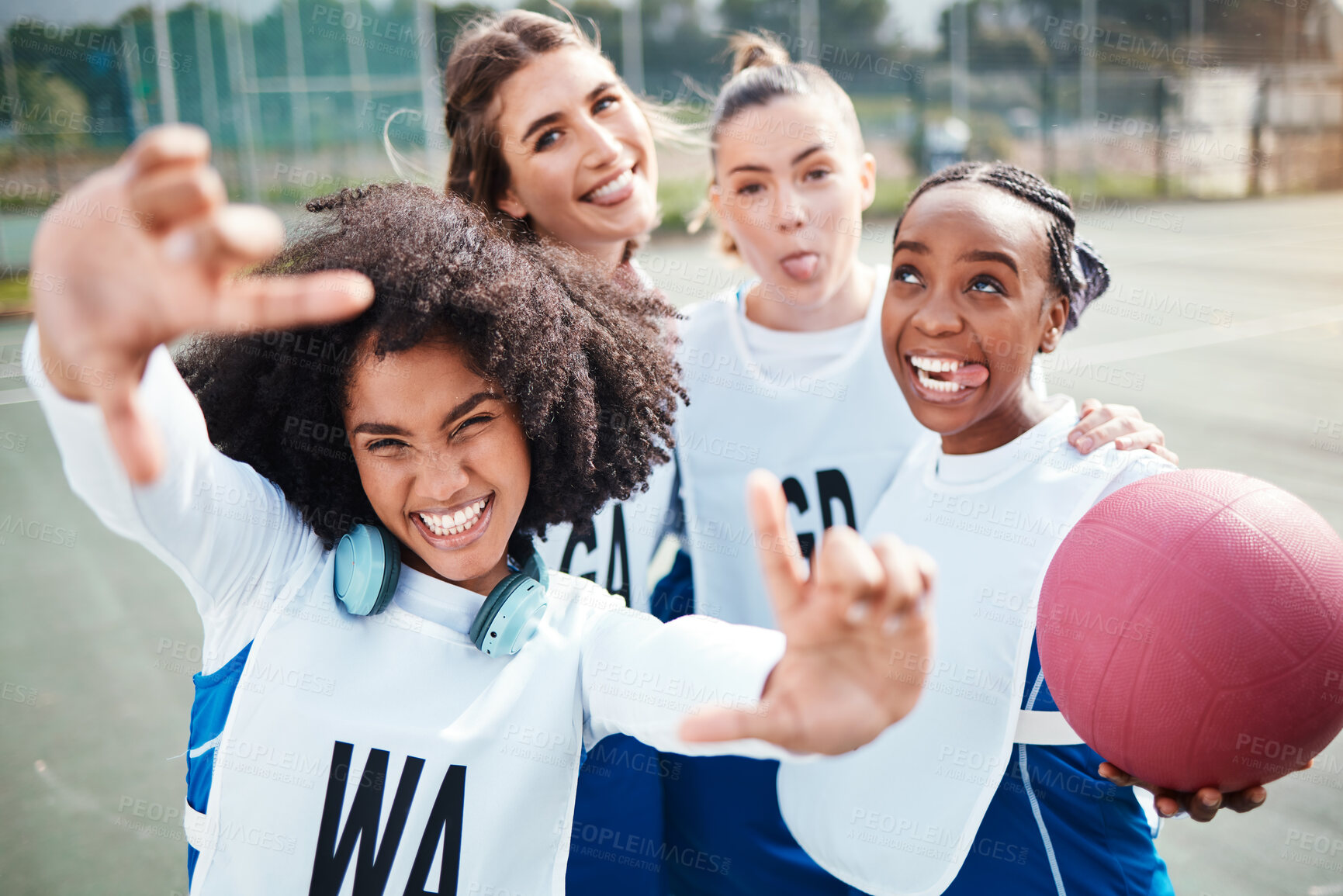 Buy stock photo Selfie, frame and a woman netball team having fun on a court outdoor together for fitness or training. Portrait, sports and funny with a group of athlete friends posing for a photograph outside