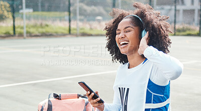 Buy stock photo Netball sports, smartphone music or happy woman listen to mp3 radio, audio podcast or media song after fitness training. Relax wellness, digital headphones or African athlete streaming sound on court
