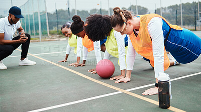 Buy stock photo Sports training, coach and netball team practice, floor push up and teaching fitness for athlete, people or girl. Health trainer, performance workout and teacher coaching group, exercise or challenge