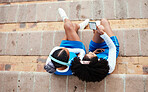 Above, phone and fitness friends on steps for music, relax or internet, search and mockup display. Sport, women and smartphone screen for social media, selfie or profile media, app or browsing